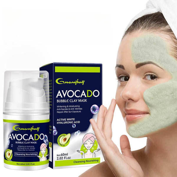 Woman applying avocado bubble clay mask with product packaging in the background