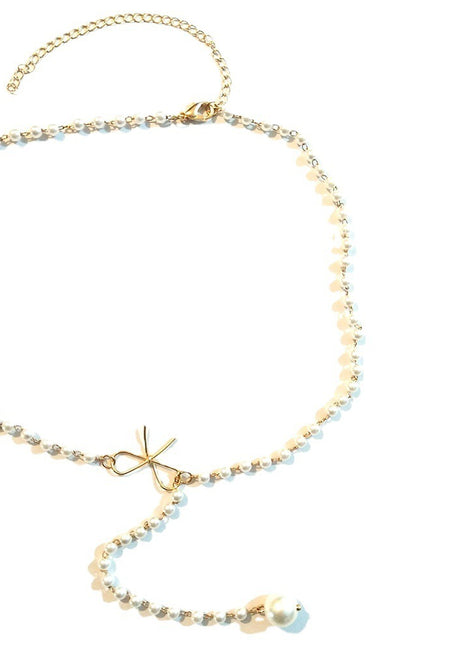 Collar con colgante de borla con perlas y lazo