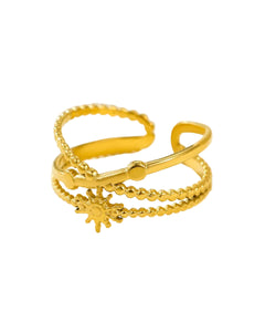 Gold ring with measurements on a beige background