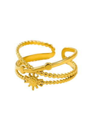 Gold ring with measurements on a beige background