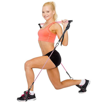 Woman exercising with resistance bands on a white background