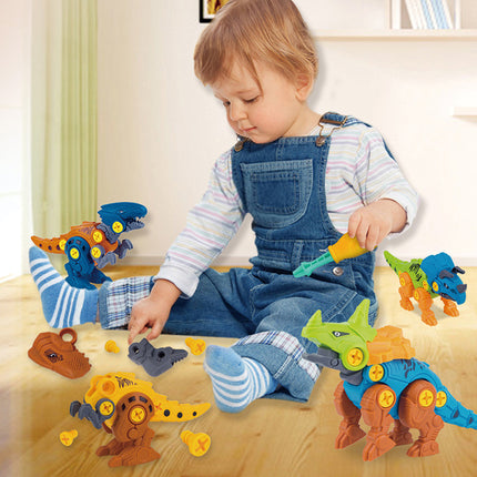 Child playing with toy dinosaurs on a wooden floor