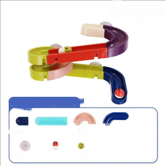 Colorful plastic toy with various components on a white background